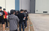 People line up to enter Coupang's Dongtan distribution center in Hwaseong, Gyeonggi, on Monday morning. [CHAE HYE-SEON]