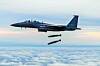 One of the four South Korean Air Force F-15K Slam Eagles and four U.S. Air Force F-16 Fighting Falcons drop two Joint Direct Attack Munition (JDAM) guided bombs during a drill in the early hours of Wednesday, in response to North Korea's intermediate-range ballistic missile (IRBM) launch on Tuesday. [YONHAP]