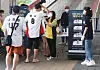 Fans get their temperatures checked as they line up to watch a baseball game at Suwon KT Wiz Park in Gyeonggi Sunday, the first time since the coronavirus pandemic. The Korean government last week announced that spectators will once again be able to watch Korean professional baseball games in stadiums starting Sunday, with seats limited to 10 percent of capacity. [YONHAP]