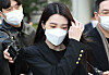 Actor Lizzy leaves the Seoul Central District Court in southern Seoul after her sentencing on Thursday. [YONHAP]