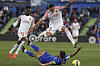 Mallorca defender Franco Russo leaps over Getafe striker Cristian Portu during a La Liga match between Getafe and RCD Mallorca at Coliseum Alfonso Perez stadium in Getafe, Spain on Friday.  [EPA/YONHAP]