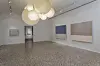 The installation view of the joint exhibition of Danh Vo, Isamu Noguchi and Park Seo-bo. Here shows a room with Park's dansaekhwa pieces on the wall and Noguchi's 'Akari' light sculptures on the ceiling. [WHITE CUBE]