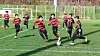 Football players from an elementary school team chase the ball during a training session. [South Jeolla Province Offce]