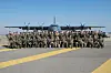 South Korean Joint Chiefs of Staff Chairman Gen. Kim Seung-kyum poses with South Korean and U.S. special operations forces for a photo in front of a Lockheed AC-130J Ghostrider on Monday. [JOINT CHIEFS OF STAFF]