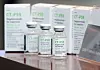 Bottles of Celltrion's Covid-19 treatment candidate CT-P59 and test kits are put on display at the bio firm's factory in Incheon. [NEWS1]