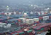 This photo, taken Feb. 1, 2025, shows stacks of shipping containers at a port in Busan, about 320 kilometers southeast of Seoul. [YONHAP]