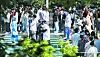 Medical staff at Seoul Medical Center in southern Seoul waiting to be tested for Covid-19 at the parking lot of the hospital on May 19 after four nurses there tested positive earlier in the day. [NEWS1]