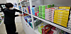 A pharmacist organizes stacks of medicine at a pharmacy in Jongno District, central Seoul, on Dec. 27. [YONHAP]