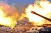 In this photo released by Pyongyang's state-run Rodong Sinmun, the North Korean military conducts a live artillery firing drill on Sept. 6. [NEWS1]