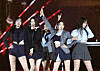 Girl group IVE performing in the rain on April 30 [NEWS1]