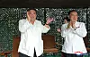In this photo released by the Korean Central News Agency, North Korean leader Kim Jong-un, left, celebrates the launch of the Hwasong-18 solid-fuel intercontinental ballistic missile on Wednesday. [YONHAP]