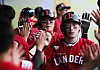 Choi Ji-hoon, front, and Choo Shin-soo of the SSG Landers celebrate in the dugout after coming home on a two-run double from Choi Jeong during a game against the Samsung Lions in Daegu on Sunday. [YONHAP]