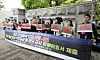 Schoolteachers protest in front of the Jeju District Court on April 29 to demand heavier punishment of an offender who illegally filmed women’s toilets at a high school on Jeju Island last year. [YONHAP]