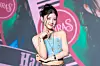 Kiiras’ Harin poses for photos during a showcase for the release of the EP, “KILL MA BO$$,” at the Ilchi Art Hall in Gangnam District, southern Seoul, on June 9. [DANIELA GONZALEZ PEREZ]