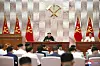 North Korean leader Kim Jong-un addresses officials during an enlarged meeting of the North's ruling Workers' Party Central Military Commission (CMC) on Tuesday, held to discuss measures to relieve the damage caused by Typhoon Maysak. [YONHAP]