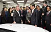 Hyundai Motor Group Chairman Euisun Chung, fourth from left, speaks with Indonesian President Joko Widodo, fourth from right, in front of the automaker’s Kona Electric car in Ulsan in 2019. [HYUNDAI MOTOR GROUP]