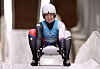 Aileen Christina Frisch of Korea reacts after her third run at the National Sliding Centre in Beijing on Tuesday. [REUTERS/YONHAP]