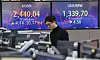 Screens in Hana Bank's trading room in central Seoul show the Kospi closing at 2,440.04 points on Thursday, up 0.17 percent, or 4.14 points, from the previous trading session. [YONHAP]