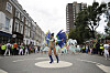 FILE - In this Monday, Aug. 27, 2018 file photo, costumed revellers perform in the parade during the Notting Hill Carnival in London. London's Notting Hill Carnival traces its roots to the emancipation of Black slaves and race riots in the city during the late 1950s. Organizers say the event is more important than ever amid the worldwide campaign for justice following the death of George Floyd in police custody. But their message of resistance and reconciliation will be delivered online worldwide this weekend after the COVID-19 pandemic forced the party to reinvent itself as a virtual event. [AP/YONHAP]