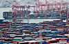Cargo ready for export at a dock in Busan on Friday. Korea's exports in September hit a record after increasing 17 percent year on year. At the current rate, exports are expected to break the full-year record achieved in 2018. [YONHAP]