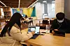 Gwangju University students attend online classes at a school library in Gwangju, South Jeolla on the first day of their school year in March. [YONHAP]