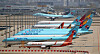 Korean Air Lines and Asiana Airlines carriers stand idle at Incheon International Airport last month. [YONHAP]