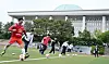 Putting aside their differences, bipartisan lawmakers take part in a friendly football match held at a field in front of the National Assembly in Yeouido, western Seoul, on Monday. From left, People Power Party (PPP) Rep. Song Seog-jun, Democratic Party floor leader Park Chan-dae, National Assembly Speaker Woo Won-shik, People Power Party Chairman Han Dong-hoon and National Assembly Vice Speaker Joo Ho-young, get ready to start a match. [JOINT PRESS CORPS]