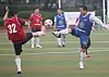 Putting aside differences, lawmakers of rival parties take part in a friendly soccer match held at a field in front of the National Assembly in Yeouido, western Seoul, on Monday. [YONHAP]