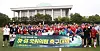 Lawmakers of rival parties take a commemorative photo after a friendly soccer match in front of the National Assembly in Yeouido, western Seoul, on Monday. [YONHAP]