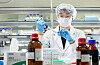 An SK Bioscience researcher conducts tests to develop a Covid-19 vaccine at the company's lab. [SK BIOSCIENCE]