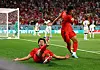 Cho Gue-sung, left, celebrates after scoring Korea's second goal during a World Cup Group H match between Korea and Ghana at the Education City Stadium in Al Rayyan, Qatar on Monday. [REUTERS/YONHAP]
