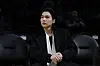 BTS member Suga at an NBA basketball game between the Los Angeles Lakers and the Dallas Mavericks on Jan. 12, 2023, in Los Angeles. [AP/YONHAP]