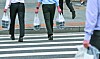 Workers walk to their offices carrying dosirak (packaged meals) in Yeouido, western Seoul, on Sept. 1. [NEWS1]