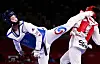 Lee Da-bin aims a kick at Serbia's Milica Mandic in the women's +67kg Taekwondo finals, on Tuesday. [YONHAP]