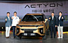 KG Mobility executives including Chairman Kwak Jea-sun, third from left, pose with the new Actyon during a media event at the company's headquarters in Pyeongtaek, Gyeonggi, on Tuesday. [KG MOBILITY]