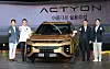 KG Mobility executives including Chairman Kwak Jea-sun, third from left, pose with the new Actyon during a media event at the company's headquarters in Pyeongtaek, Gyeonggi, on Tuesday. [KG MOBILITY]