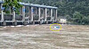 A capsized boat floats towards the Euiam Dam in Chuncheon, Gangwon, after it and two other vessels overturned in an accident caused by rapid waters flows. [YONHAP]