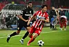 Red Star Belgrade fullback Seol Young-woo, right, dribbles the abll during a Champions League match against VfB Stuttgart at Rajko Mitic Stadium in Serbia on Wednesday. [AFP/YONHAP]