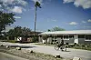 A man rides a bike down Memes Street in Boca Chica Village, Texas, Feb. 25, 2024. Employees of SpaceX have filed a formal petition to create the city of Starbase. (Meridith Kohut/The New York Times)