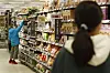 Shoppers buying grocery at a store in Seoul on Monday. The government announced increase in monitoring against price fixing amid increasing inflation pressure. [YONHAP]