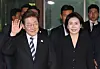 Newly elected President Lee Jae-myung, left, and his wife Kim Hye-kyung greet residents as they leave their residence in Gyeyang Destrict, Incheon on June 4. [JOINT PRESS CORPS]