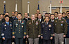 Korea's Joint Chiefs of Staff (JCS) Chairman Gen. Kim Seung-kyum, second from left, his U.S. counterpart, Gen. Mark Milley, center, and his Japanese counterpart, Gen. Koji Yamazaki, second from right, pose for a photo after trilateral talks in Washington on Oct. 20. [YONHAP]