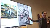Hong Sun-pyo, a professor emeritus at Ewha University, compares artist Lee Jung-seop's paintings during an appraisal session held at the Los Angeles County Museum of Art on June 26. [JOONGANG ILBO]