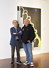 Artist Joo Jae-hwan, left, and webtoonist Joo Jae-Ho-min pose for photos after an interview with the Korea JoongAng Dailly in front of Joo Jae-hwan's painting ″Spring Rain Descending a Staircase″ (1980) at the ″Homin and Jaehwan″ exhibition held at the Seoul Museum of Art. [JEON TAE-GYU]