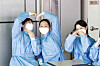 The medical staff at a Covid-19 testing center in Buk District, Gwangju, pose for a photo Thursday. [YONHAP]