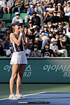 Ekaterina Alexandrova reacts after beating top seed Jelena Ostapenko in the finals of the Hana Bank Korea Open at Olympic Park Tennis Center in Songpa District, southern Seoul on Sunday. [YONHAP]