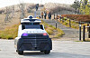 An autonomous patrol robot roams a park in Siheung, Gyeonggi, on Tuesday. According to the Siheung city government, the patrol robot developed by the automobile parts developer Mando will patrol the park between 6 p.m. and 11 p.m. three times a week until November 2022. [SIHEUNG CITY]