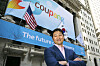 Coupang Founder and CEO Bom Kim poses in front of the New York Stock Exchange facade before his company's initial public offering on March 11, 2021. [NEW YORK STOCK EXCHANGE]