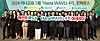 Hana Financial Group Chairman Ham Young-joo, center, poses for a photo with Hana employees who completed this year's Hana WAVEs program aimed at empowering women and fostering future leaders during the 2024 Hana WAVEs Conference in central Seoul on Monday. [HANA FINANCIAL GROUP]