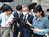 Former special counsel Park Young-soo is surrounded by reporters as he leaves the Seoul Central District Court in Seocho District, southern Seoul, after his warrant review hearing on June 29. [NEWS1]